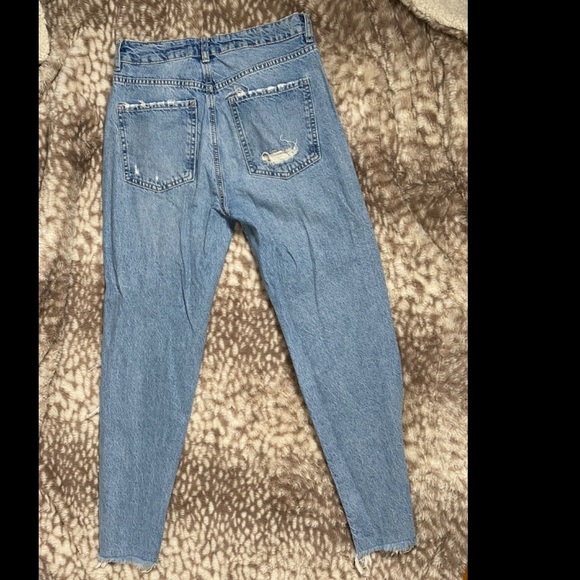 Ripped blue jeans - Picture 4 of 4